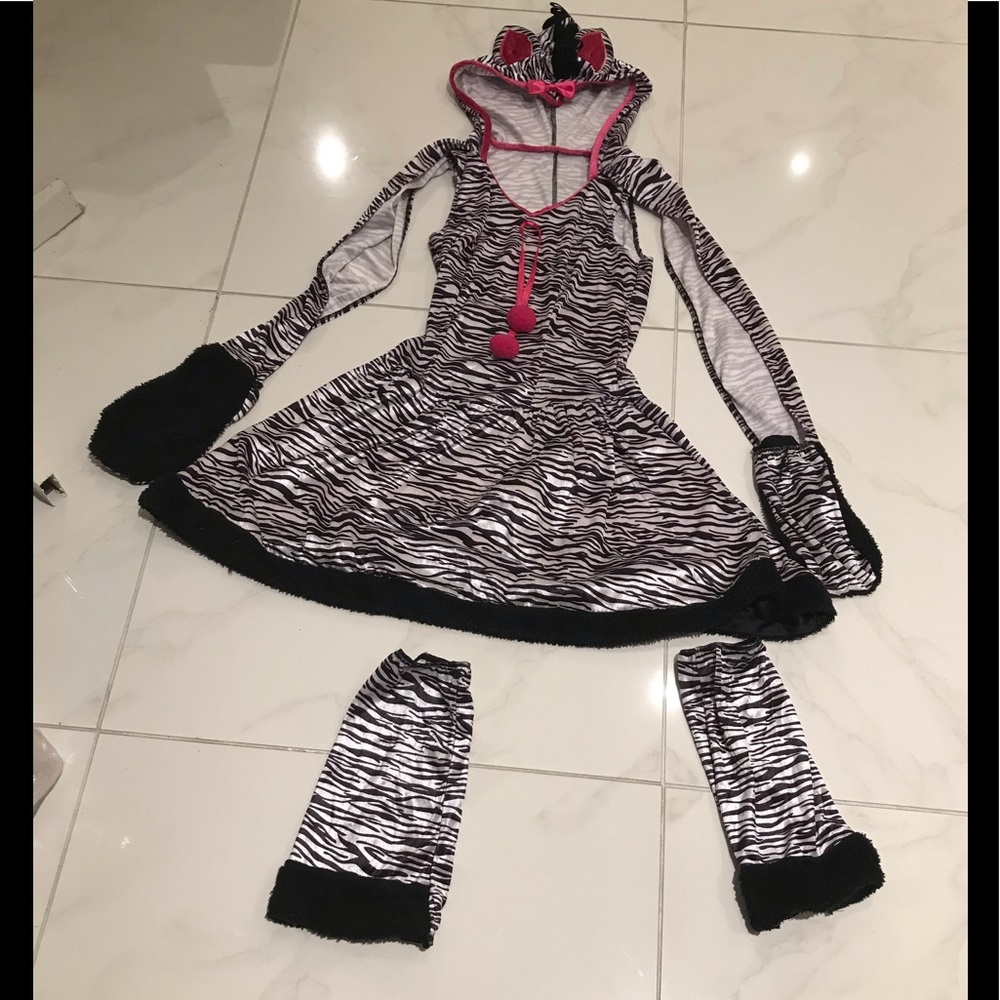 Young girl zebra costume.